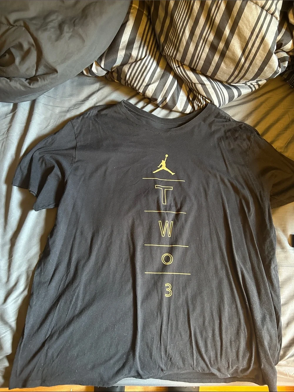 Jordan Men’s Black Short-Sleeve Tee with Yellow Vertical Graphic